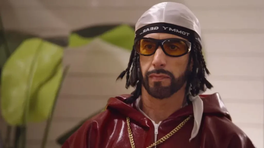 Sacha Baron Cohen jako Ali G ve filmu Who Iz I?