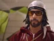 Sacha Baron Cohen jako Ali G ve filmu Who Iz I?